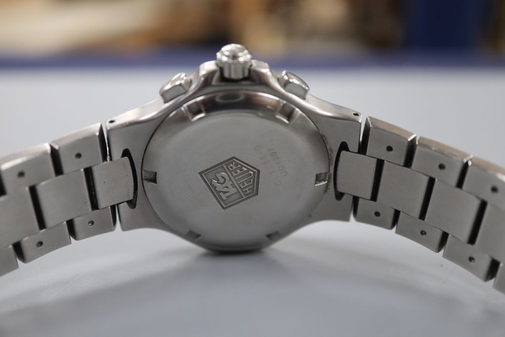 A ladys stainless steel Tag Heuer Professional quartz wrist watch, on stainless steel Tag bracelet.